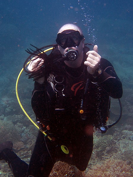 Silverswift Dive Instructor Shaun with a Feather Star