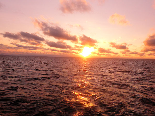 Sun set over the Coral Sea and Great Barrier Reef