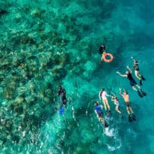 Family of Adventure Drift Snorkelers