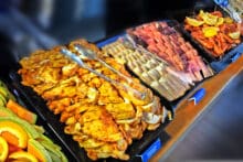 Buffet lunch with seafood, salads and hot dishes served onboard the Poseidon snorkel and dive catamaran.