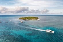 Catamaran ferry approaching the Green Island jetty on the Great Barrier Reef.
