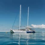 Ocean Spirit’s 32m sailing catamaran glides across the Coral Sea from Cairns to Michaelmas Cay