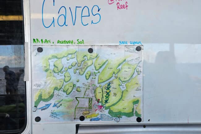 Hand-drawn Norman Reef dive-site map used during OceanQuest snorkel & dive briefings.