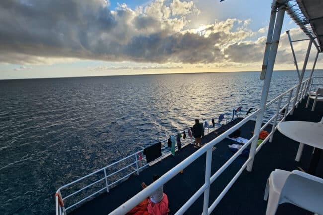 Sunset over the Great Barrier Reef viewed from OceanQuest’s upper deck.
