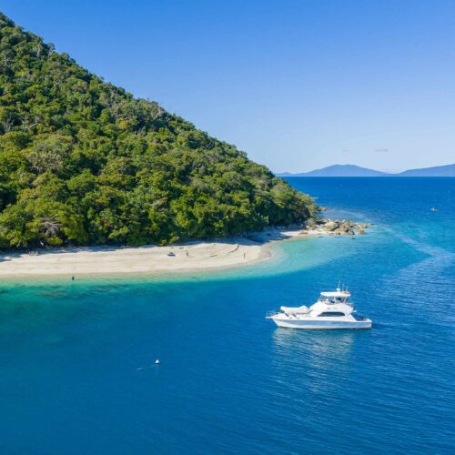 Private luxury yacht Allure anchored near Fitzroy Island